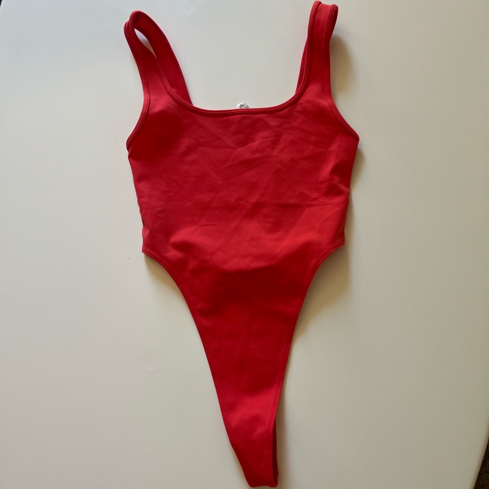 Also body suit thong red